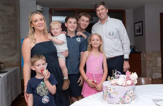 Liz Tenety posing with her family