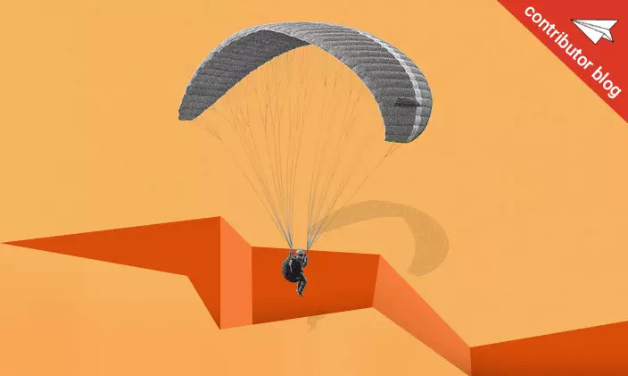 A person gliding down to earth via a parachute to signify rebounding