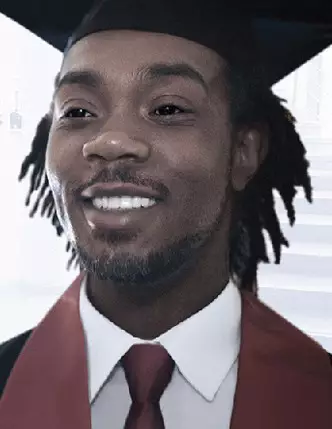 Proud graduate smiles 