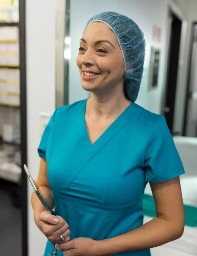 Smiling medical professional working in a hospital