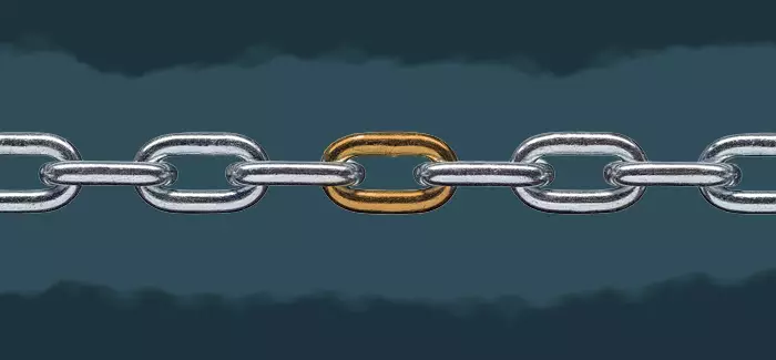 Chain links against a blue background with one gold link to indicate the value of learning investment