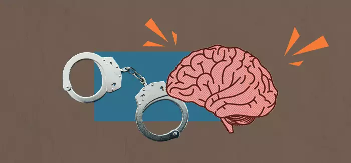 A brain and handcuffs representing the difference between criminal justice and criminology