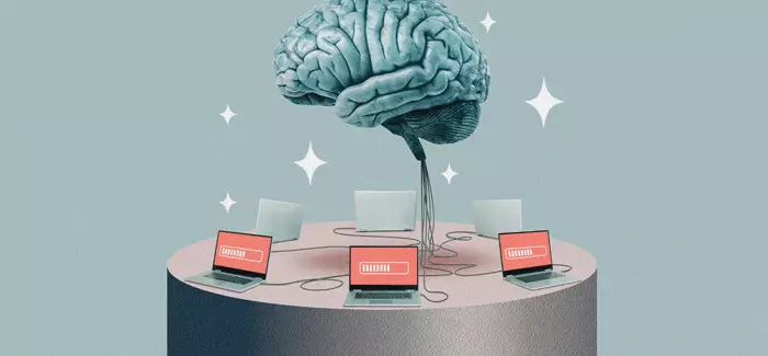 A brain surrounded by laptops to signify skills gap and AI