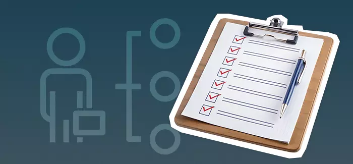 A clipboard with checkmarks next to a list to signify a 'business plan outline'