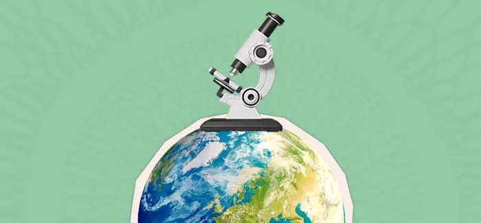 A collage style image of a microscope sitting on top of a world to signify an environmental scientist