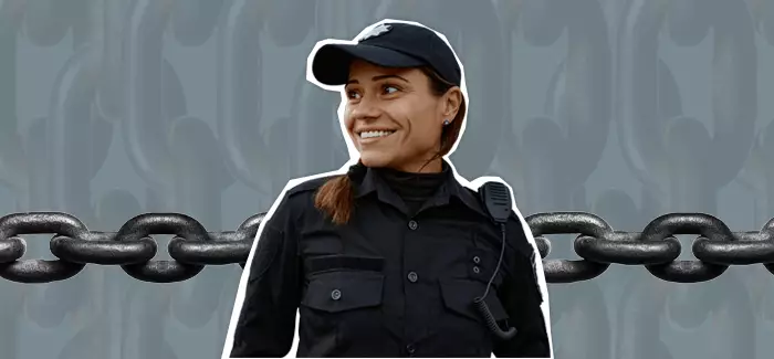 Photo of a female security guard to signify security officer vs security guard