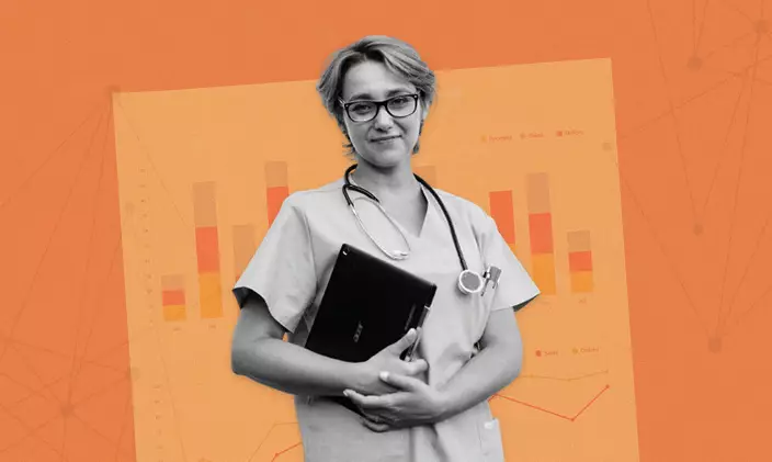 Female nurse holding charts on informatics
