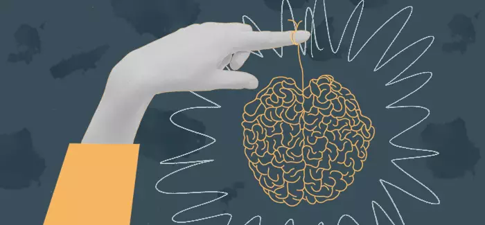 A hand with a piece of string that connects to a brain made of string