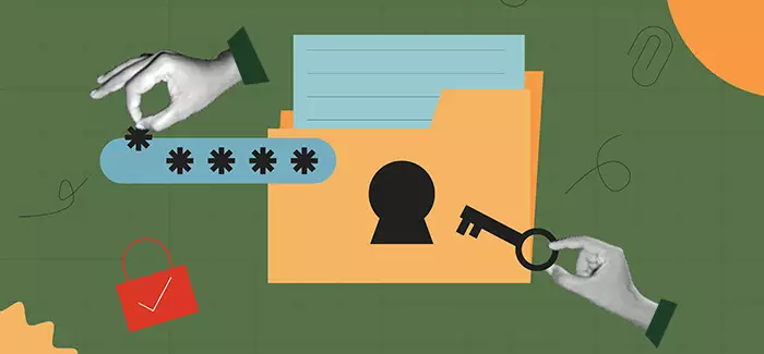 A hand holding a key that fits a keyhole on a file folder to signify the importance of operating systems