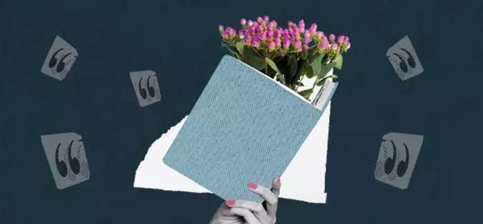 A hand holds an open book with flowers growing from it to symbolize personal growth quotes