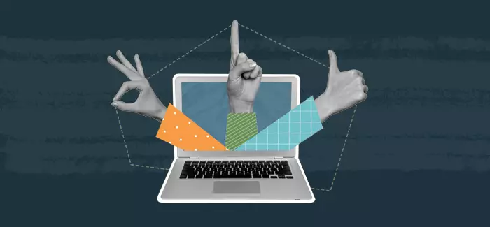 The arms and hands coming out of a laptop to signify that a master's degree in It is worth it.