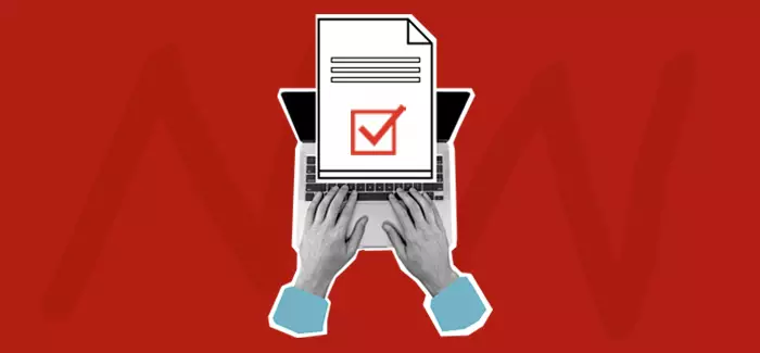 Hands working at a laptop to signify a quality control manager