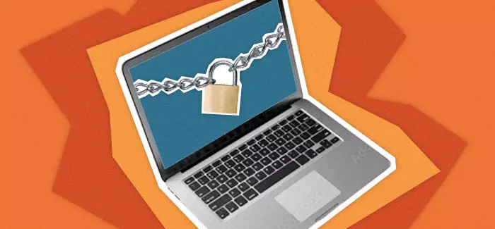 A laptop with a photo of a chain and lock on the screen to signify cybersecurity