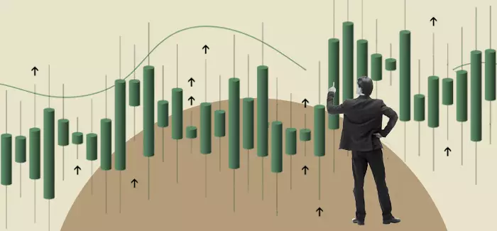 Man who works in business analytics looking at a three-dimensional chart