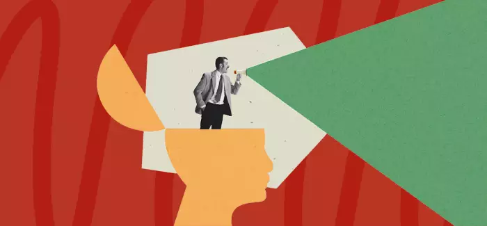 A business man shouting to represent how to be assertive