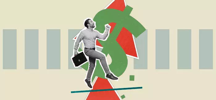 A business man skipping with his briefcase in front of a dollar sign to signify serial entrepreneur