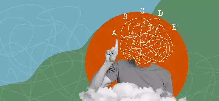 A person with a scribbled brain for a head pointing to the different types of psychology