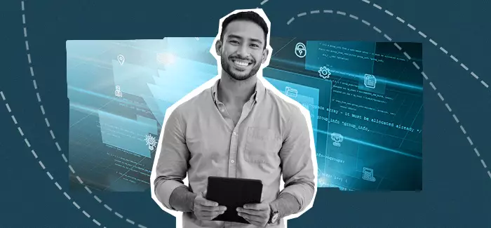 An IT professional holding a notebook to signify what is information technology