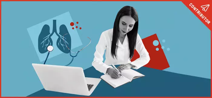 A nursing student working with a laptop and notebook in their rn to bsn program