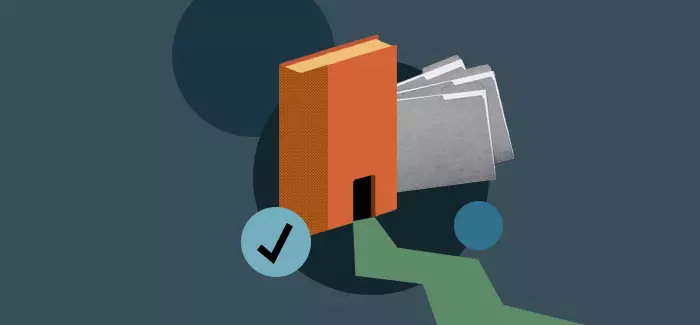 Books that are meant to look like a college to signify college admissions director