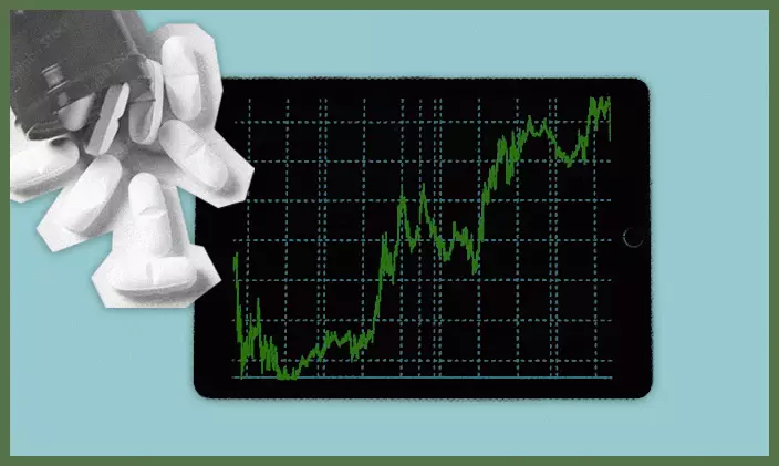 Pills and a chart to represent health informatics