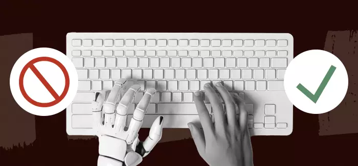 A human hand and a robot hand typing at a keyboard as one, signifying writing an AI resumé