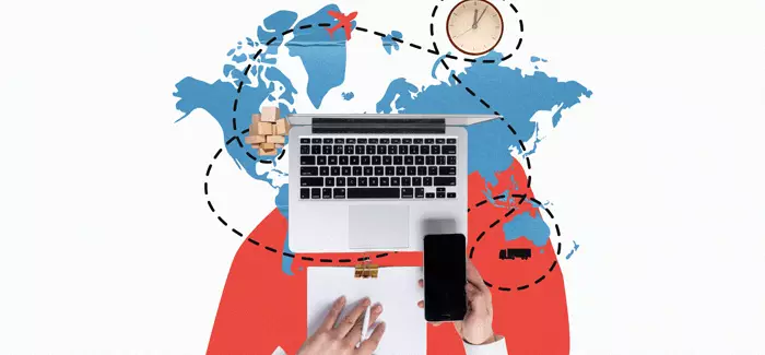 Birds eye view of someone working t a laptop to represent a supply chain manager
