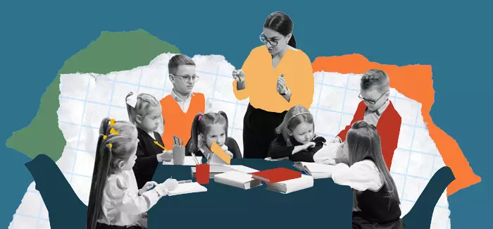 elementary school teacher talkig to eight children seated around the table, to represent careers in elementary schools