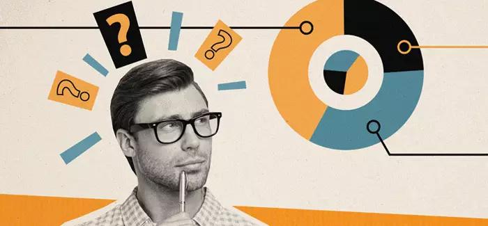 Thoughtful looking man holding pen and looking at pie chart.