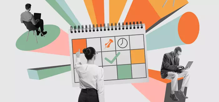 Business professionals looking at their laptops and a calendar to represent operations director
