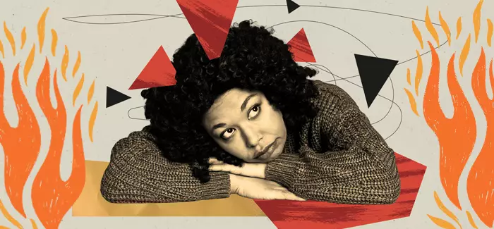 A student surrounded by flames to signify how to recover from burnout