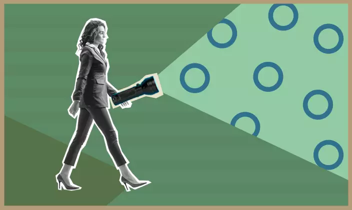 Business woman with a flashlight to indicate leading the way