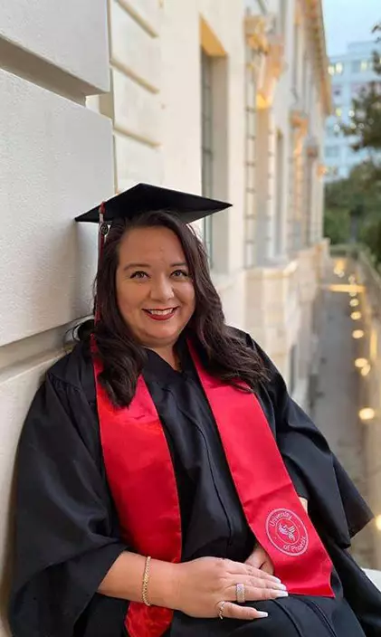 Cristina Gudiel in her graduation regalia