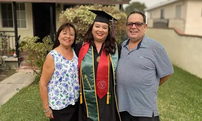 Cristina Gudiel with her parents