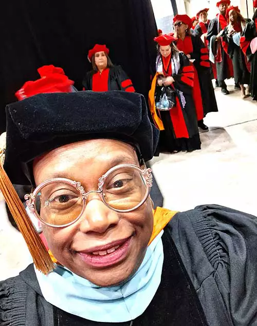Dr. Stella Smith and group of graduates at UOPX commencement, San Antonio, July 2026 