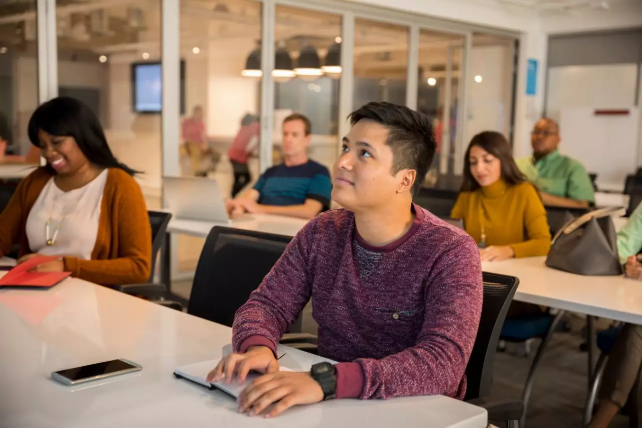 Young professional takes a class to help advance his career