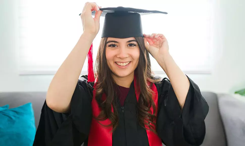 College grad with cap and gown