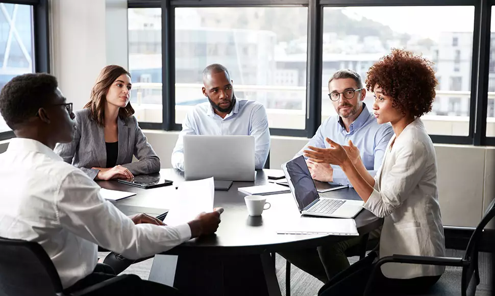 Students network at a professional business organization meeting 