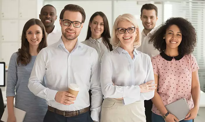 Group of psychologists smiling and standing together