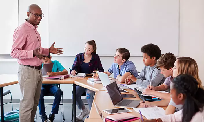 High school teacher leading a blended learning class