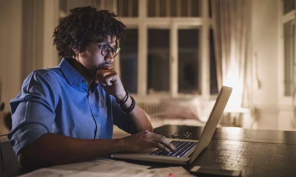 30-year-old African American male taking online classes at home
