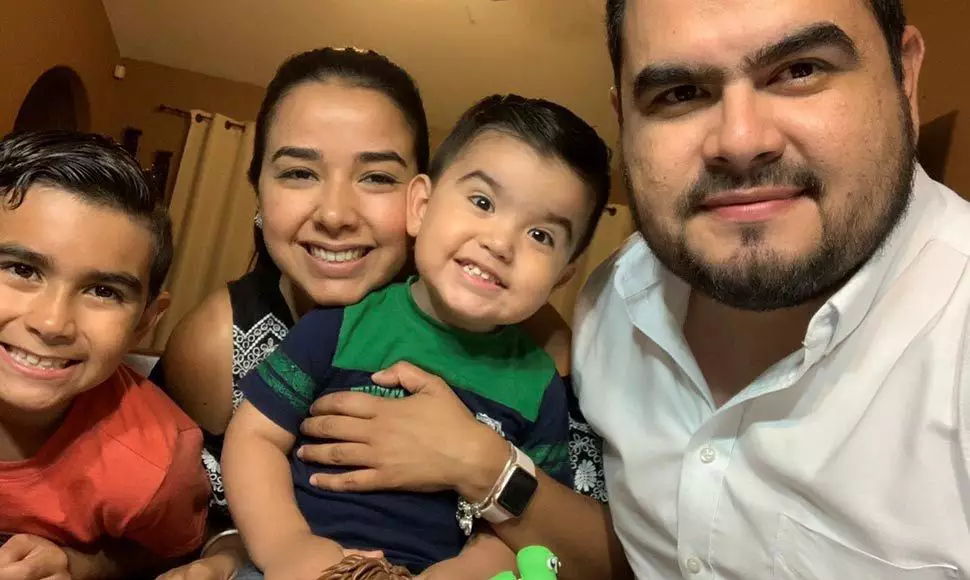 Photograph of Ruben Mireles and his family smiling