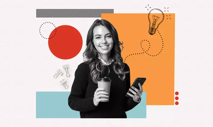 Millennial woman smiling with a coffee and phone in her hand