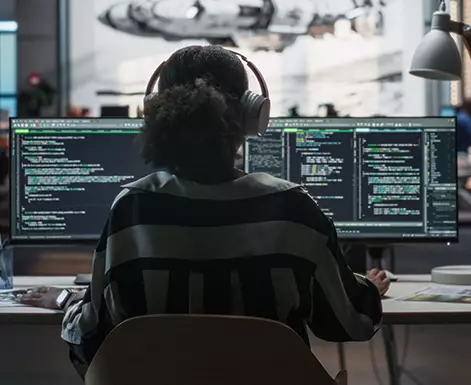 A woman working with AI skills intelligence