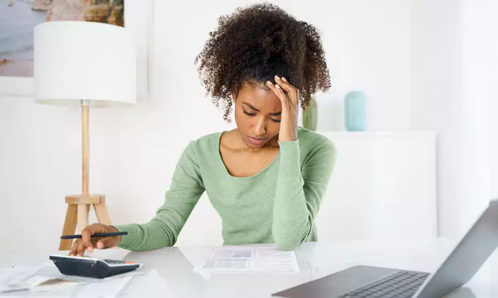 young african american woman frustrated with FAFSA